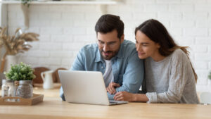 A couple planning their New England vacation to Martha's Vineyard.